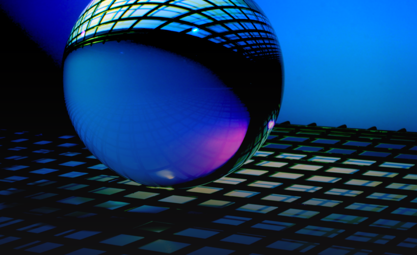 A translucent ball floating on a keyboard surface